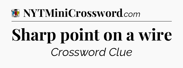 Sharp point on a wire Crossword Clue