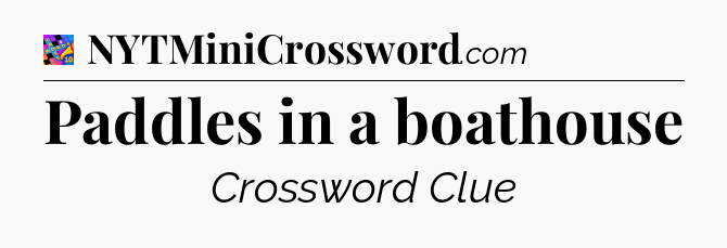 Paddles in a boathouse Crossword Clue