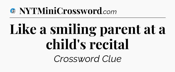 Like a smiling parent at a child's recital Crossword Clue