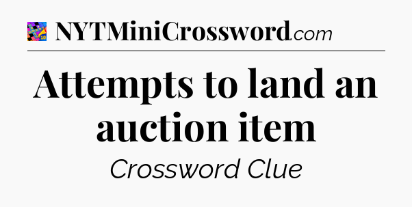 Attempts to land an auction item Crossword Clue