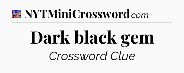Dark black gem Crossword Clue