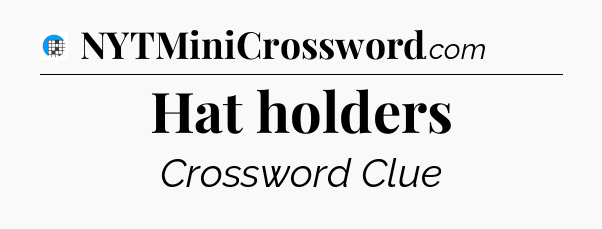 Hat holders Crossword Clue