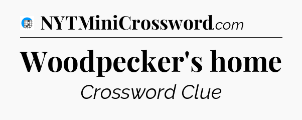 Woodpecker's home Crossword Clue