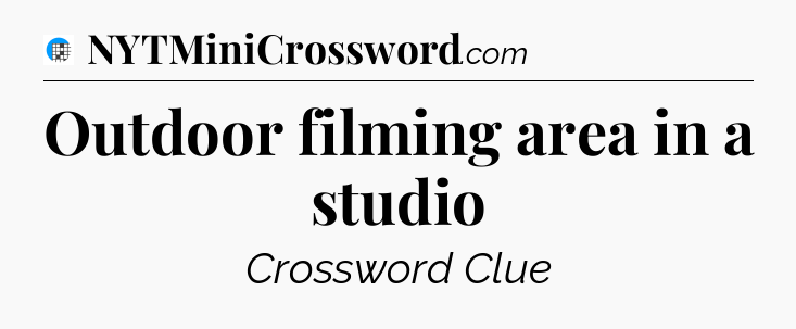 Outdoor filming area in a studio Crossword Clue
