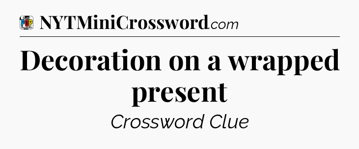 Decoration on a wrapped present Crossword Clue