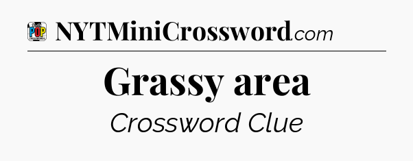 Grassy area Crossword Clue