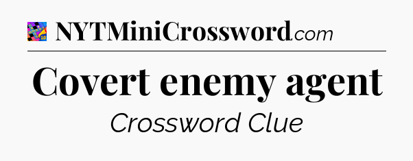 Covert enemy agent Crossword Clue