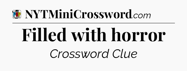 Filled with horror Crossword Clue