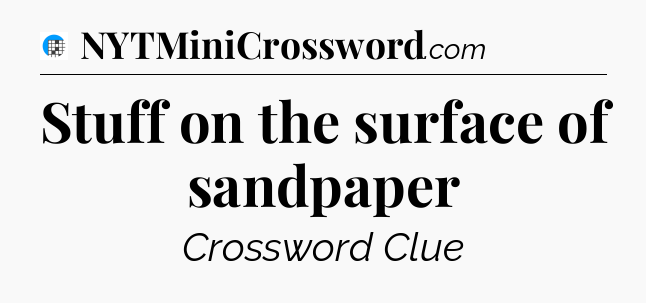 Stuff on the surface of sandpaper Crossword Clue