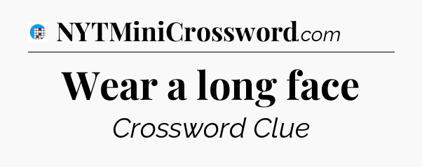 Wear a long face Crossword Clue