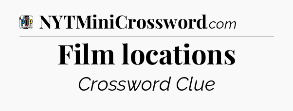 Film locations Crossword Clue