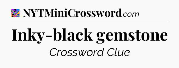 Inky-black gemstone Crossword Clue