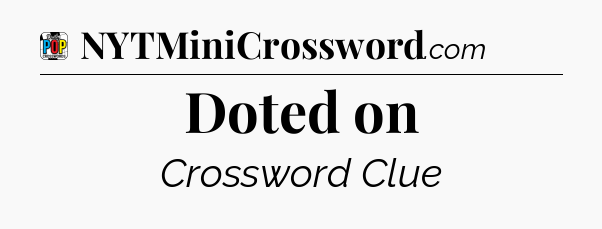 Doted on Crossword Clue