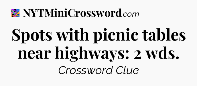 Spots with picnic tables near highways: 2 wds Crossword Clue