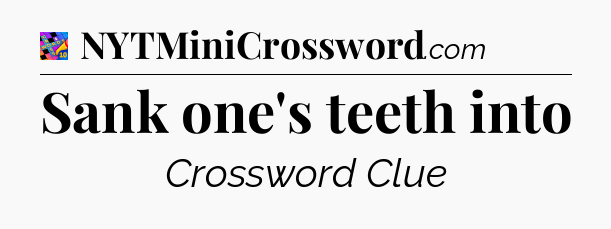 Sank one's teeth into Crossword Clue