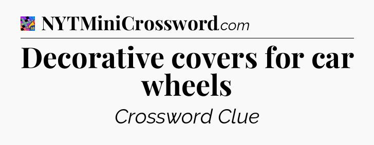 Decorative covers for car wheels Crossword Clue