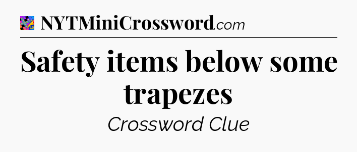 Safety items below some trapezes Crossword Clue