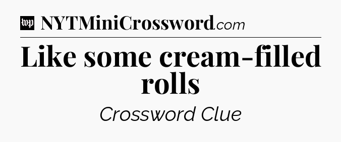 Like some cream-filled rolls Crossword Clue