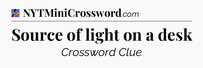 Source of light on a desk Crossword Clue