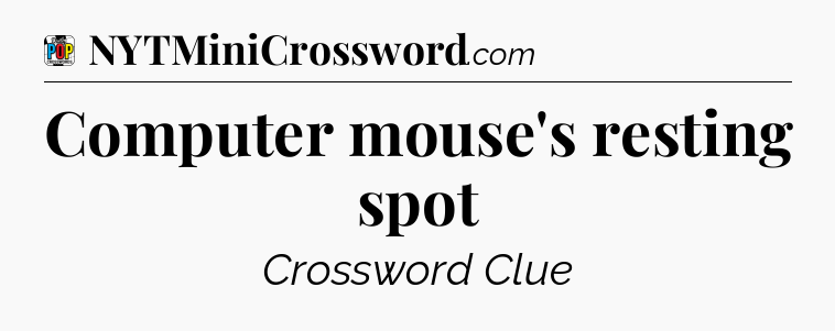 Computer mouse's resting spot Crossword Clue