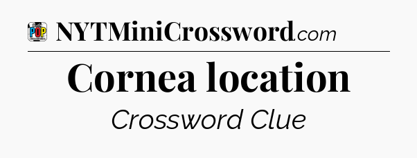 Cornea location Crossword Clue
