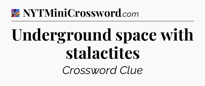Underground space with stalactites Crossword Clue