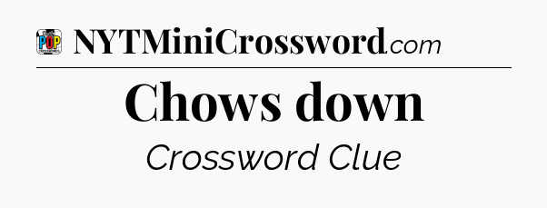 Chows down Crossword Clue