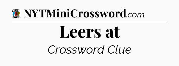 Leers at Crossword Clue