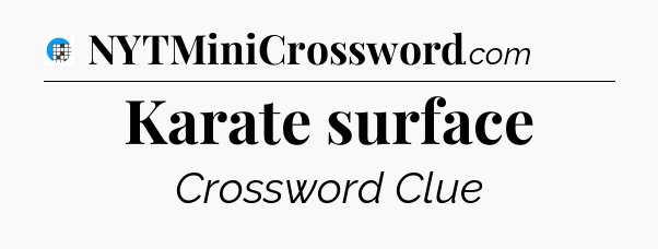 Karate surface Crossword Clue