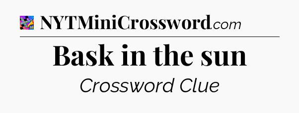 Bask in the sun Crossword Clue