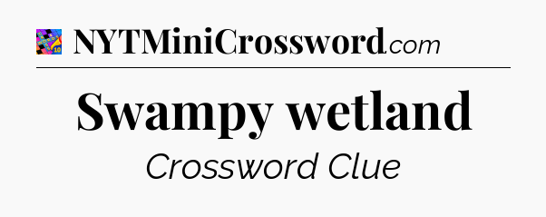 Swampy wetland Crossword Clue