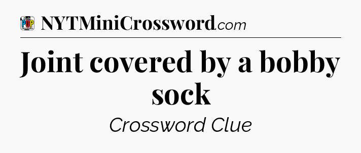 Joint covered by a bobby sock Crossword Clue