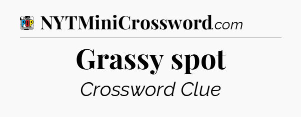 Grassy spot Crossword Clue