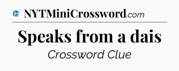 Speaks from a dais Crossword Clue