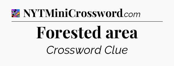 Forested area Crossword Clue
