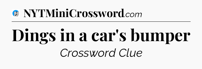Dings in a car's bumper Crossword Clue