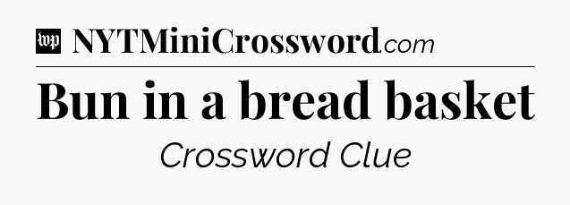 Bun in a bread basket Crossword Clue