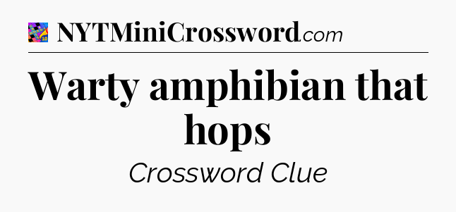 Warty amphibian that hops Crossword Clue
