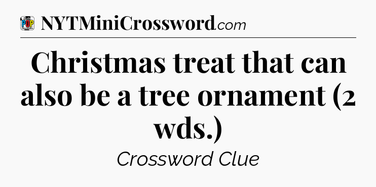 Christmas treat that can also be a tree ornament (2 wds.) Crossword Clue