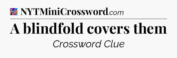 A blindfold covers them Crossword Clue