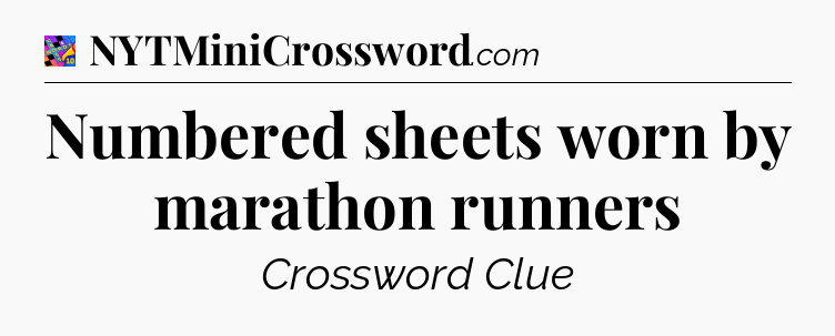 Numbered sheets worn by marathon runners Crossword Clue