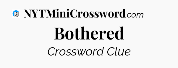 Bothered Crossword Clue